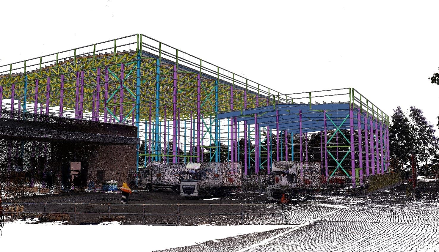 Tekla structural model aligned over a 3D laser-scan point cloud of a warehouse site