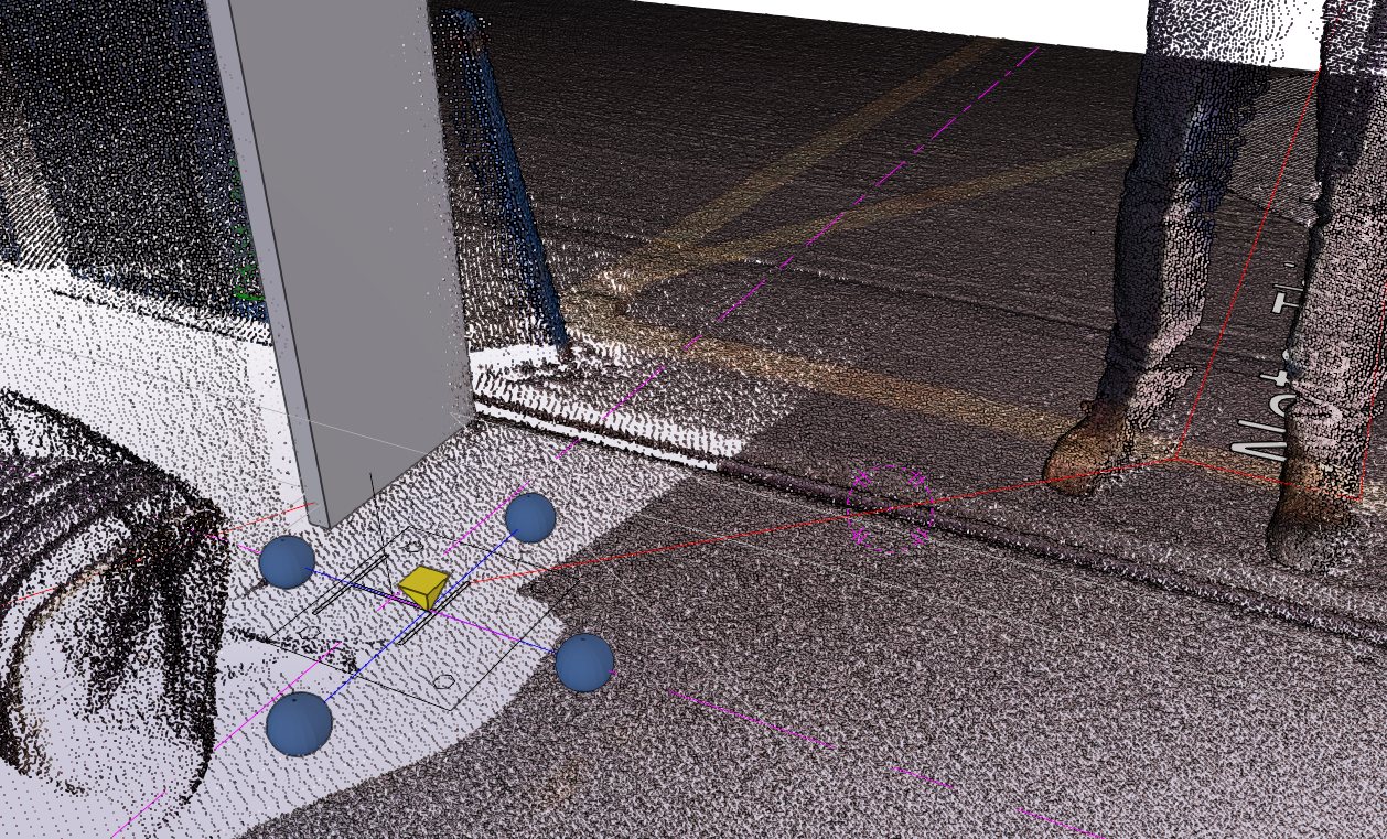 Point cloud of a site floor with set-out points marked against the design model